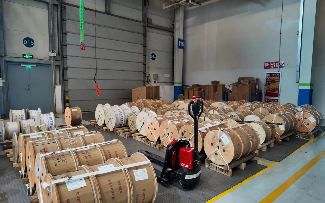 Incoming conductor reels stored in the material preparation workshop